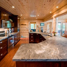 Kitchen with Log Siding accent wall