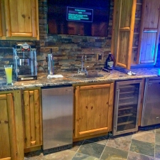 Log & Panel Custom Stained Bar Cabinets