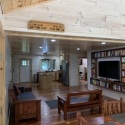 Bright White Washed Blue Paneling Cabin Interior