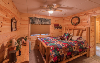 bedroom in knotty pine paneling