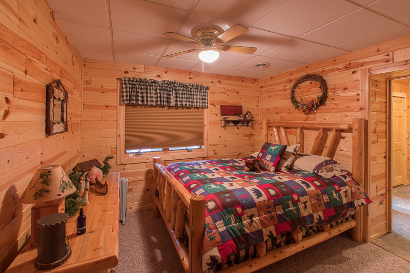 bedroom in knotty pine paneling