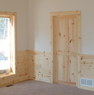  Wood doors look great with wood or drywall.