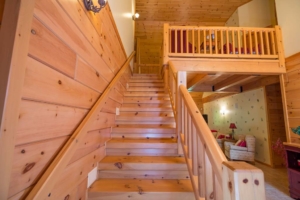 Knotty pine panels stairs